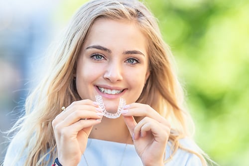 Teen with invisible braces